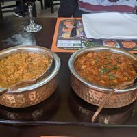 Eggplant curry and a chana masala at Sher E Punjab in Banos De Agua Santa