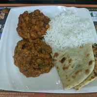 Curries come with rice and bread at Sher E Punjab in Banos De Agua Santa