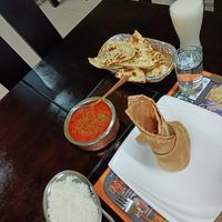Naan, kidney bean curry, and rice at Sher E Punjab in Banos De Agua Santa