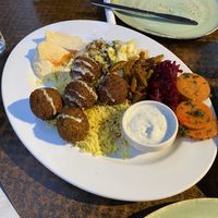Falafel plate marked vegan but came with cow’s milk yoghurt😒 at Fat Camel Cafe in Whangarei