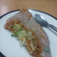 Shan Pizza, rise flour base with tasty peanut sauce and shredded veggies. at Shan Food in Chiang Mai