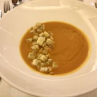Soup of the day: Pumpkin purée with Extra Virgin Olive Oil and rosemary croutons. Vegan and fantastically good. at Jaegerhaus Agriturismo in Cortina D Ampezzo