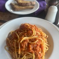 Vegan pasta and garlic breadd  at Asmara in 