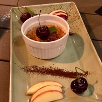 Crème Brûlée mit saisonalen Früchten. Crème Brûlée with seasonal fruits. at Försters in Berlin