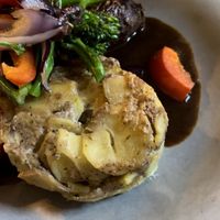 Roulade with potatoes. The Roulade is filled with mustard and pickles   at Försters in Berlin