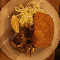 Cordon Bleu schnitzel with German roasted potatoes and coleslaw at Försters in Berlin