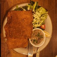 Mushroom schnitzel with German roasted potatoes and green salad. at Försters in Berlin