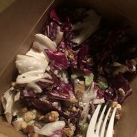 Cauliflower Waldorf salad - radicchio , sliced and toast cauliflower , celery, grapes , Asian pear, sunflower seeds , scallion , tarragon dressing (small $6.95)   at Lekka Burger in New York City