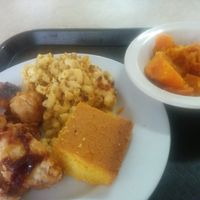 Roasted cauliflower, greens, mac & cheese, cornbread, with sweet potatoes on the side - delicious weekday brunch from the buffet. at Soul Vegetarian - South in Atlanta