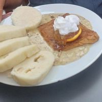 Vegan steak with dumplings and mushroom sauce at Vegalite in Brno