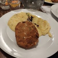 Holland schnitzel with mashed potatoes at Vegalite in Brno