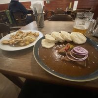 Goulash with fried potato side  at Vegalite in Brno