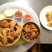 Fries and bucket with nuggets, onion rings and friend "cheese" at Végéman in Strasbourg
