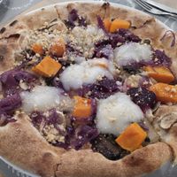 Pumpkin pizza with vegan homemade cheeze 🍕 at Il Melograno in Trieste