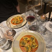 Tortelloni with a ricotta-ish filling made from lemon grass, tomato-white pesto sauce  at MESA Restaurant in Paris