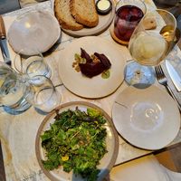 Cacao baked beets (creme vegetal, kombucha chimichurri); signature salad (seasonal greens, beetroot molasses, spiced seed crumble) at MESA Restaurant in Paris