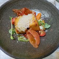 Main dish, polenta with tomatoes at MESA Restaurant in Paris