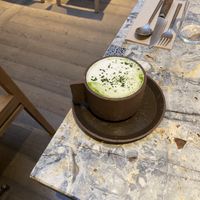 Matcha latte w/ almond milk   at MESA Restaurant in Paris
