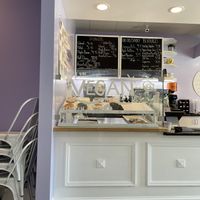 Separate case with the vegan options for donuts, fritters, and cookies  at Sugar Donuts in Charlotte