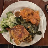 Spinach lasagna with yams and greens.  at Soul Vegetarian - Highland in Atlanta