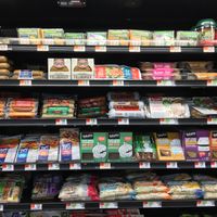 Refrigerated case in produce section at Market Basket in Claremont