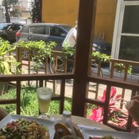 Outdoor seating with the daily special  at Sabor y Vida in Lima