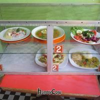 Case in front of restaurant with daily appetizer (top row) and main (bottom row) choices. at Sabor y Vida in Lima