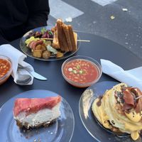 Brunch plate and Bacon&Cheese pancakes with beans, cheesecake (already half eaten 😅)  at Putsch in Montreuil