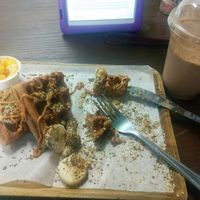 Waffle with peanut butter, chia seeds, flax, hemp hearts and bananas with pineapple on the side; Dark Knight Shake at Vegan Town in Johnson City