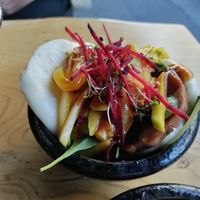 Bao bun with mango and vegan ham at TA Vegan House in Hamburg