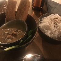 Satay skewers and rice noodles  at TA Vegan House in Hamburg