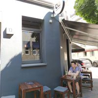 Tables outside at TA Vegan House in Hamburg