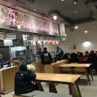 Inside the Junzi--you can see the tables and assembly line counter here at Junzi in New York City