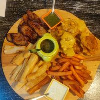 Vegan sharing starter - yucca fries, sweet potato fries, and two types of plantain. Sauces were all very tasty! at L'Arepa in Bordeaux