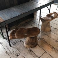 Love the quirky feet chairs.  at Strive Foods in Sandy Springs