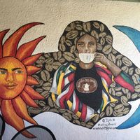Mural facing the outdoor seating at Barista Del Barrio in Tucson