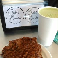 Oat milk matcha latte and veggie pakora at Selby's Bunker in Dartmouth