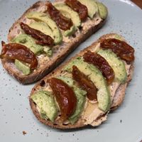 Sourdough with Tomato, Hummus, Avo and Chilli  at Ethos Brothers in Brentwood