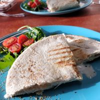 Feta and olive flatbread at Ethos Brothers in Brentwood