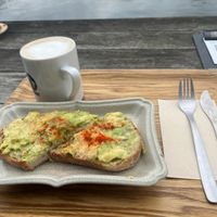 Avocado on toast with oat cafe lattee  at Optimus Cafe in Osaka