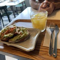 Avo Toast with Orange Juice with Ice  at Optimus Cafe in Osaka