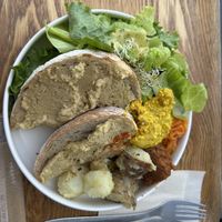 Hummus, scrambled tofu and sausage breakfast   at Optimus Cafe in Osaka