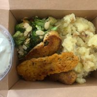 seitan steaks with roasted mashed potatoes, baked broccoli with almods, tartar sauce at Vanderveg in Ljubljana