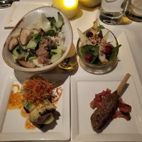 Clockwise: Thai basmati rice, pear salad, kafta, and forbidden roll. at Walt Disney World - California Grill in Lake Buena Vista