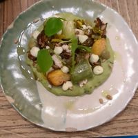 Main dish with leeks, mushrooms, brussel sprouts etc at Locafé in Grenoble