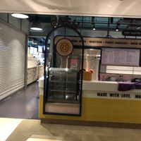 The door to the dining hall, first counter on the left at Sook Sathorn - Silom in Bangkok