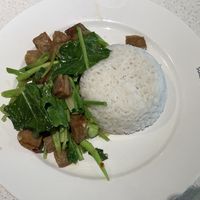 Kale with crispy plant-based meat and rice, 119 baht  at Sook Sathorn - Silom in Bangkok