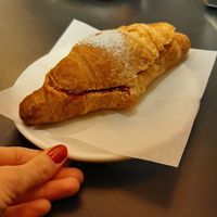 Vegan croissant with jam at Zebu in Bologna