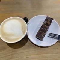 Oat Latte and Caramel and Chocolate cheesecake!   at The Quirk Space in Olney