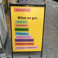 Placard in front of store. at Om Juice Bar in New York City